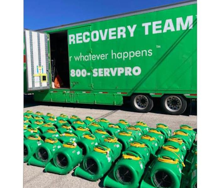 Drying equipment infront of large loss truck.