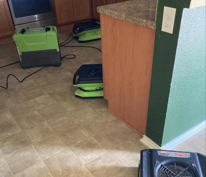 Drying equipment on floor.