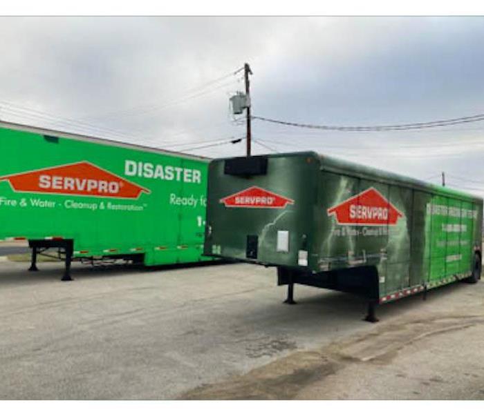 Large loss trucks parked.